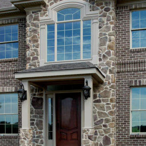 Stonecraft fieldstone bucktown facade on center section of home