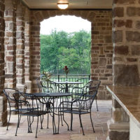 Stonecraft heritage chardonnay facade on outdoor columns and patio